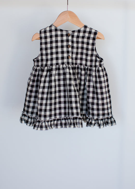 Linen blouse with ruffle hem